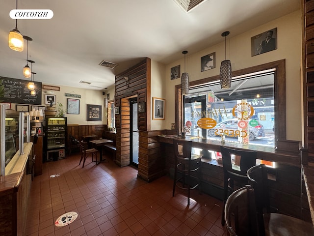 interior space with dark tile patterned floors