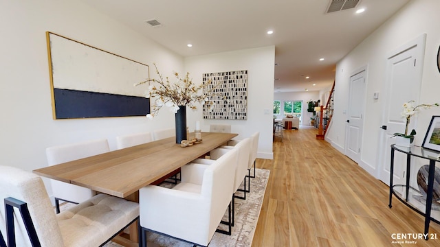 dining area featuring light hardwood / wood-style flooring