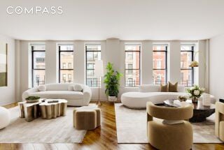 living room featuring hardwood / wood-style floors and a healthy amount of sunlight