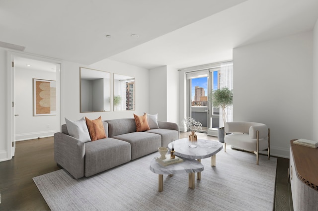 living room with dark wood-type flooring