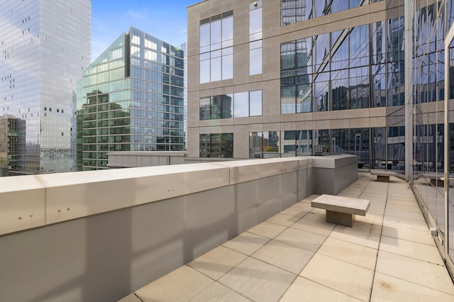 view of patio with a balcony