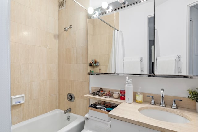 bathroom featuring vanity and shower / bath combo