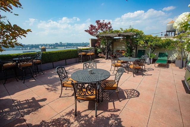 view of patio featuring a water view