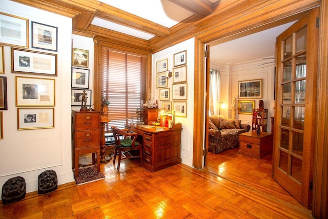 office space featuring beam ceiling, crown molding, and parquet flooring