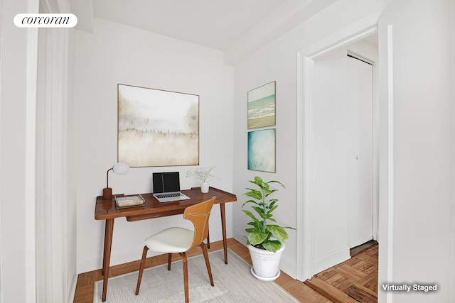 office space featuring parquet flooring