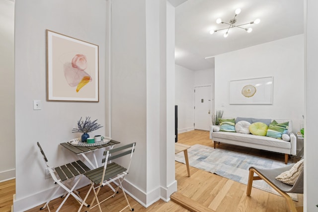 interior space with hardwood / wood-style floors and a notable chandelier