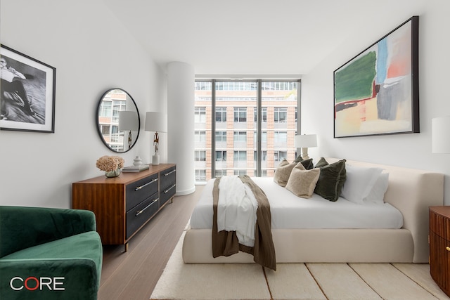 bedroom featuring light hardwood / wood-style floors