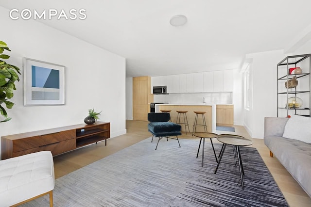 living room featuring light wood-type flooring