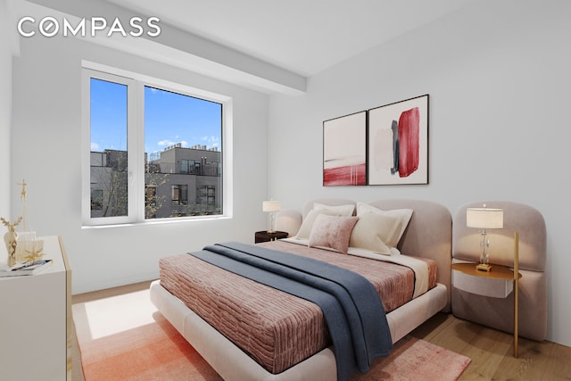 bedroom with light hardwood / wood-style floors