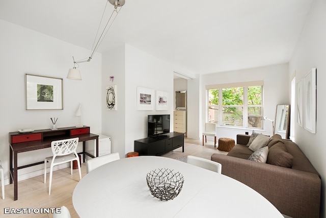 dining space featuring light hardwood / wood-style floors