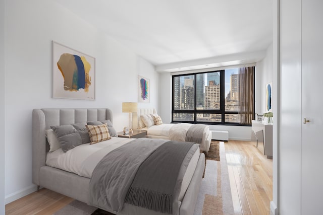 bedroom featuring light wood-type flooring