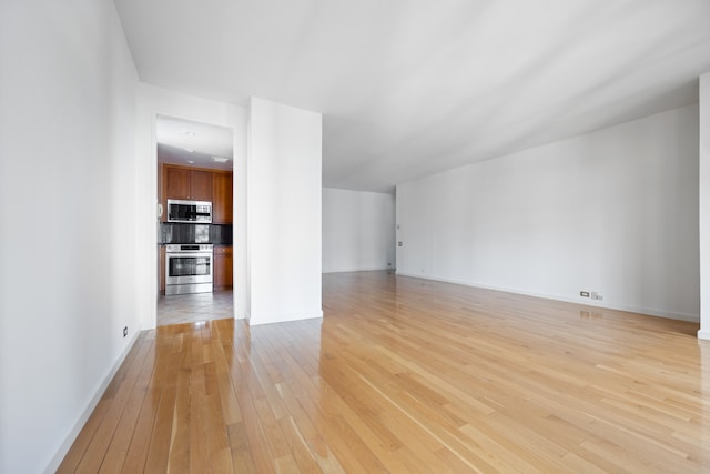 unfurnished living room featuring light hardwood / wood-style floors