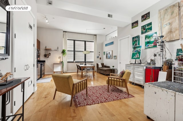 living room featuring light hardwood / wood-style floors