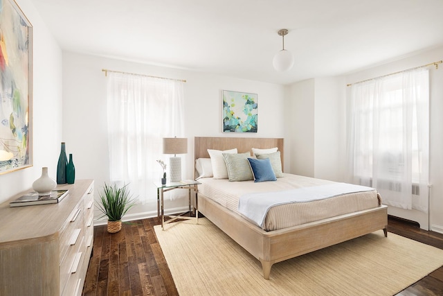 bedroom featuring dark hardwood / wood-style floors