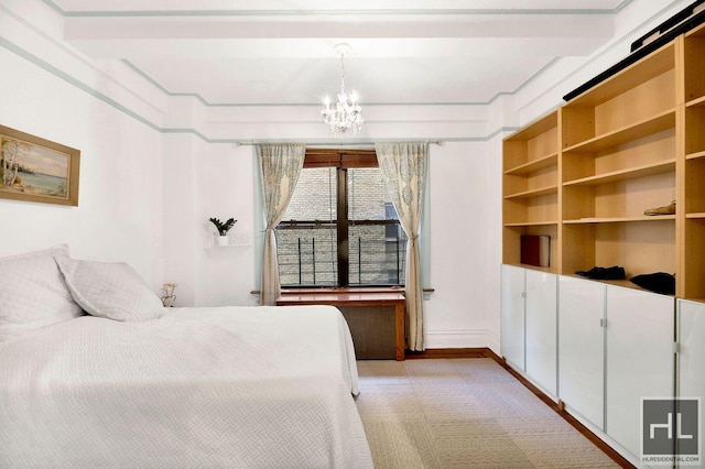 bedroom featuring a notable chandelier