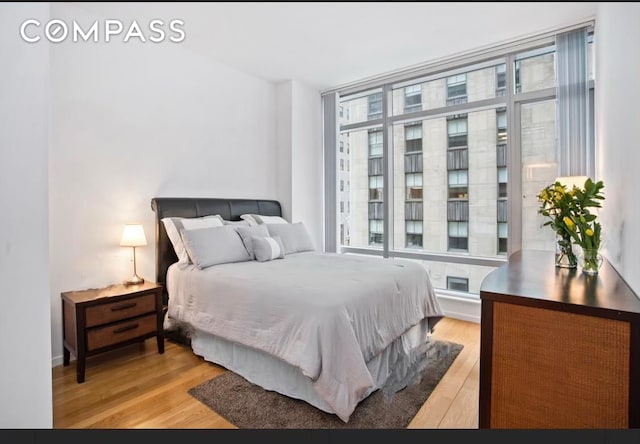 bedroom featuring light hardwood / wood-style floors