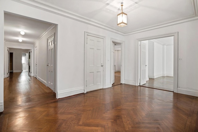 hallway with ornamental molding and dark parquet floors