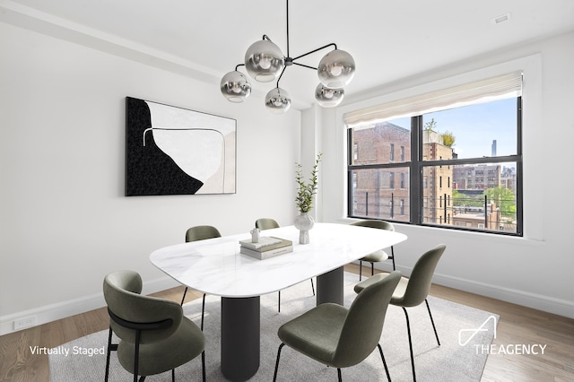 dining room featuring wood-type flooring