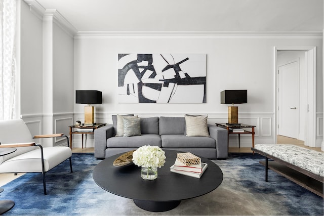 living room with crown molding and concrete floors