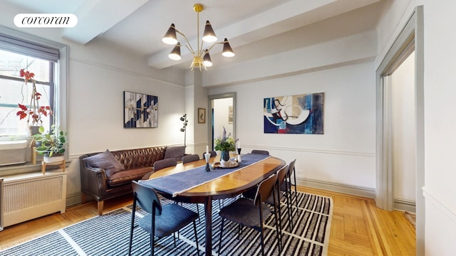 bedroom featuring beamed ceiling, radiator heating unit, and hardwood / wood-style flooring