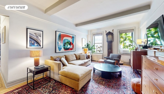 sitting room featuring beam ceiling and wood-type flooring