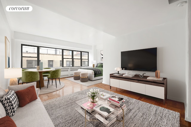 living room with parquet flooring and radiator heating unit