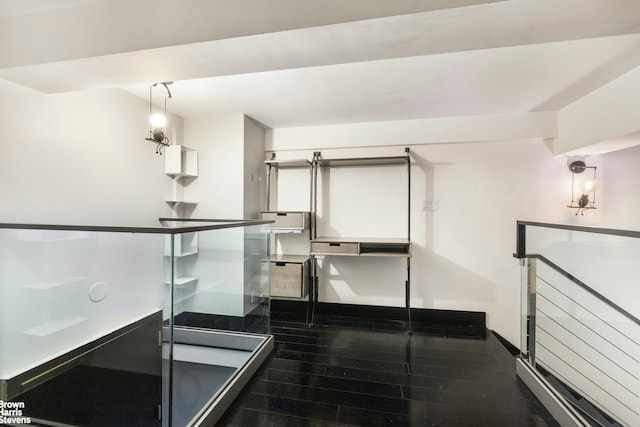 bathroom with hardwood / wood-style flooring