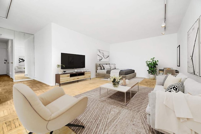 living room featuring parquet floors