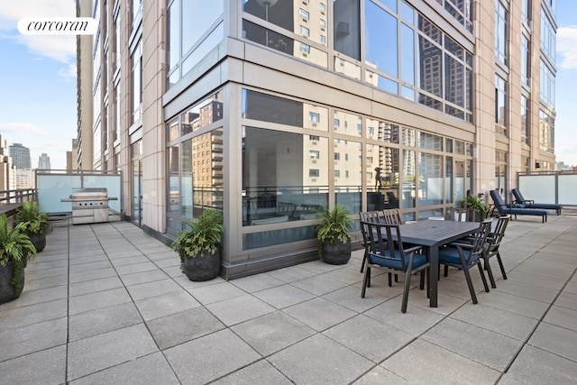 view of patio / terrace with a balcony