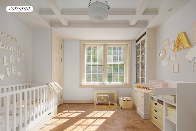 unfurnished bedroom featuring radiator heating unit, beamed ceiling, a nursery area, and coffered ceiling