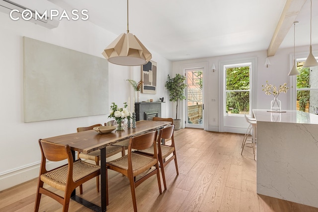 dining space featuring light hardwood / wood-style floors