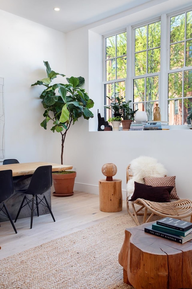 sitting room with light hardwood / wood-style floors