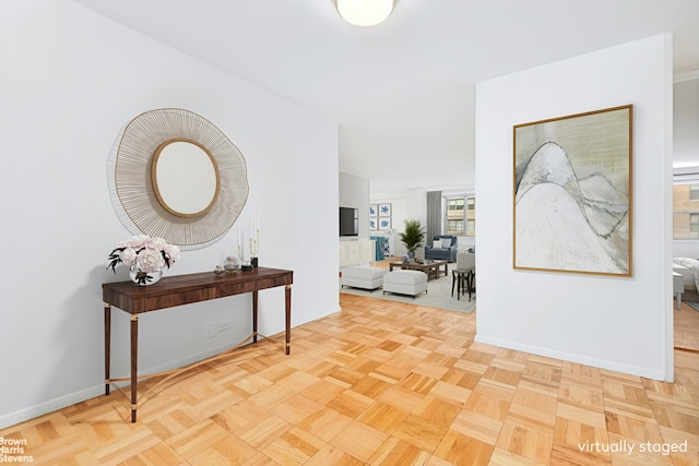 entryway with light parquet flooring