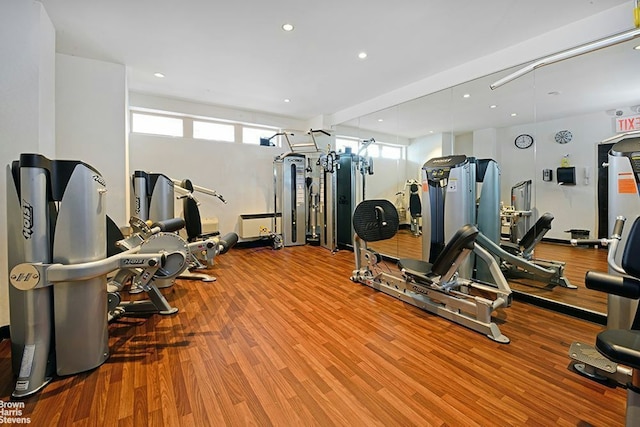 gym featuring light wood-type flooring