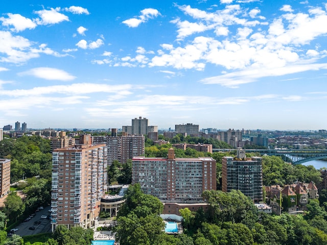 property's view of city featuring a water view