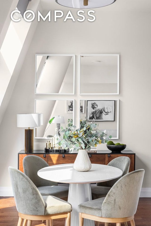 dining room featuring wood-type flooring