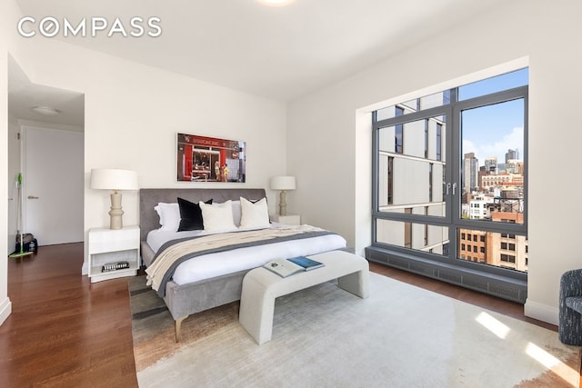 bedroom featuring hardwood / wood-style flooring