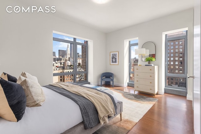 bedroom with wood-type flooring