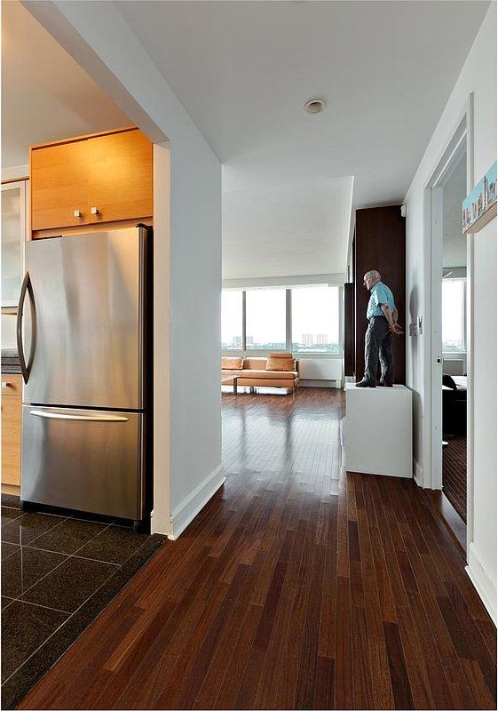 hallway featuring dark wood-type flooring