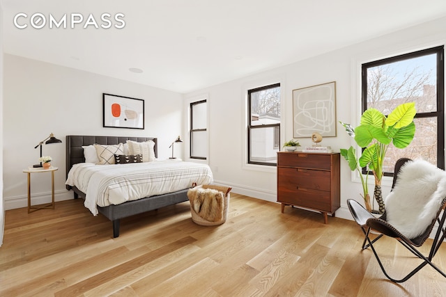 bedroom featuring light hardwood / wood-style flooring