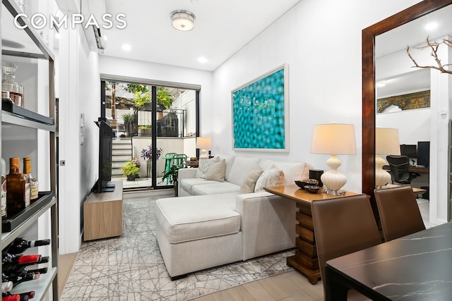 living room with light hardwood / wood-style flooring