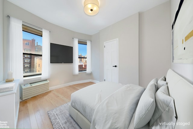 bedroom featuring light wood-type flooring