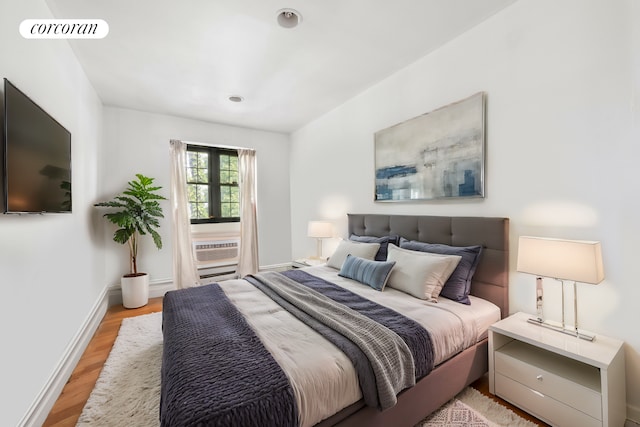 bedroom featuring light hardwood / wood-style floors