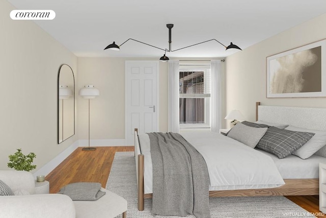 bedroom featuring wood-type flooring