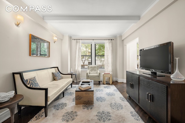 living room with dark hardwood / wood-style floors and crown molding