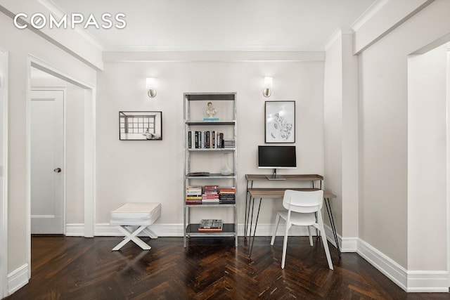 home office with dark parquet floors and ornamental molding