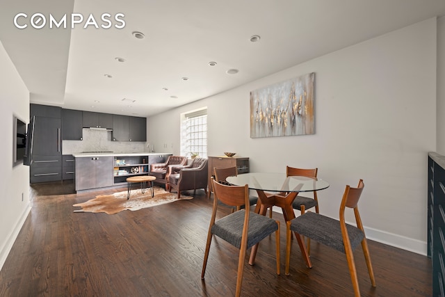 dining room featuring dark hardwood / wood-style floors