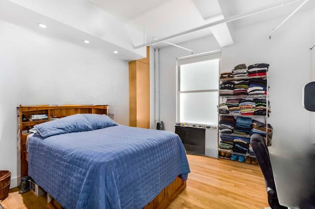 bedroom featuring hardwood / wood-style flooring