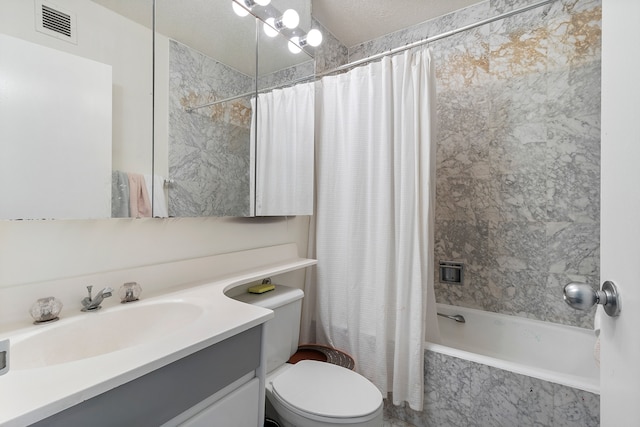 full bathroom with vanity, shower / bath combo, a textured ceiling, and toilet