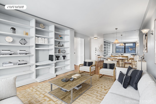 living room featuring light parquet flooring